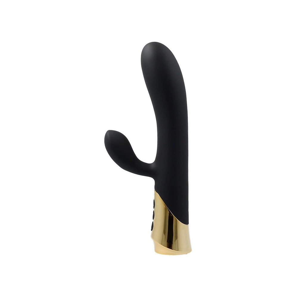 Vibratore ricaricabile in silicone color cannella con stimolatore vaginale e anale.