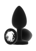 Gioiello da gamba con strass, vestito nero
